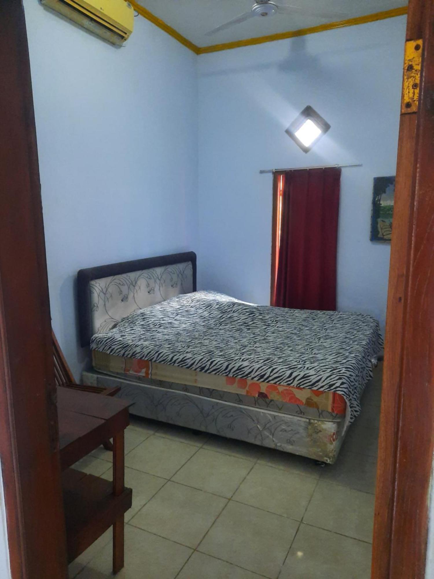 Red Beach Homestay Pasanggaran Habitación foto